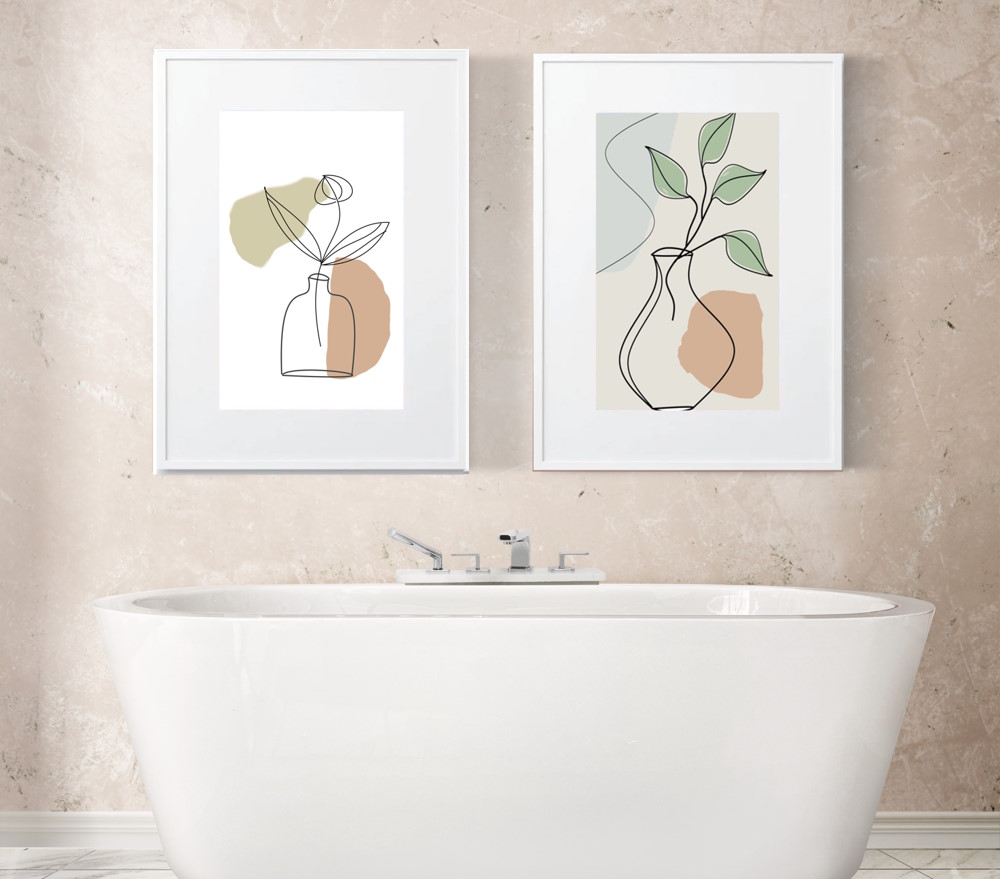 Picture frames hanging in luxury bathroom home decor interior wall art